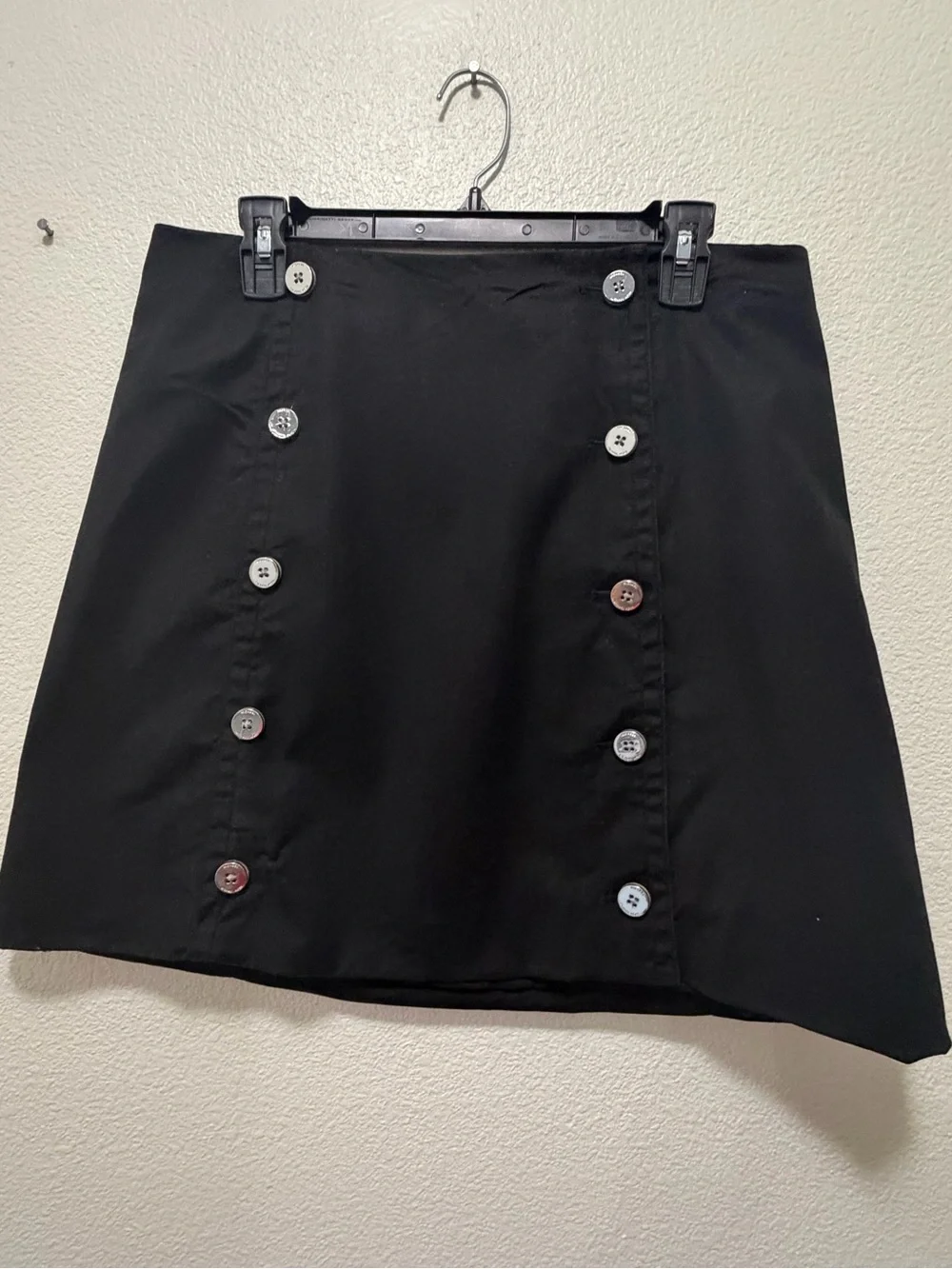 Michael Kors black lined mini skirt with double row silver buttons